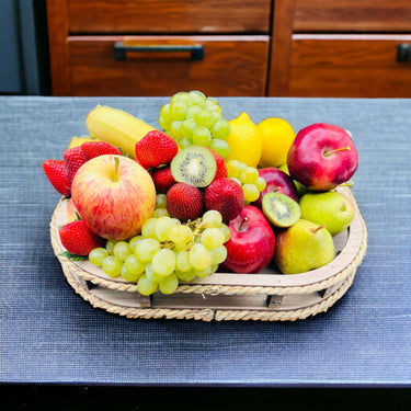 Fresh Harvest Fruit Basket: Bananas, Red Apples, Pears, Lemons, Strawberries, Grapes, and Native Basket